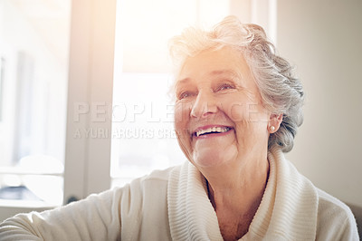 Buy stock photo Relax, happy and smile with old woman on sofa for free time, retirement and weekend. Lens flare, happiness and mindset with senior person in living room at home for elderly, positive and carefree 