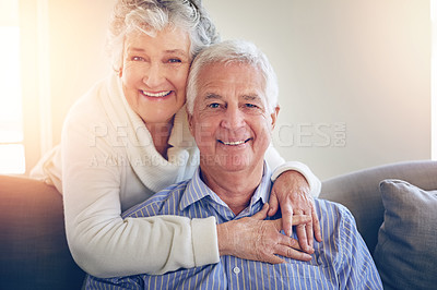 Buy stock photo Portrait of a senior couple relaxing at home