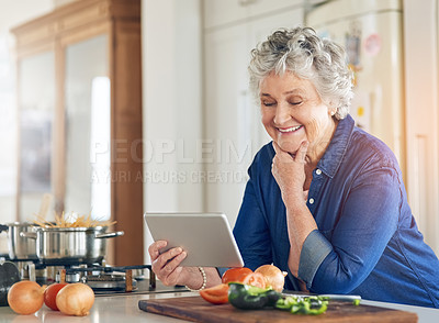 Buy stock photo Tablet, cooking vegetables or happy old woman in kitchen while online for learning on recipe blog at home. Smile, healthy food or senior person on digital app to search for a vegan diet on website