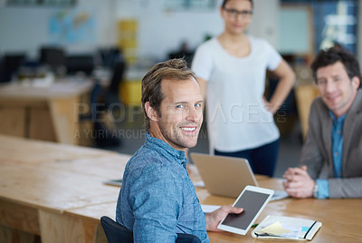 Buy stock photo Teamwork, portrait or happy developers in meeting for discussion or brainstorming together in office. Diversity, digital app or programmers networking with technology, tablet or laptop in workplace