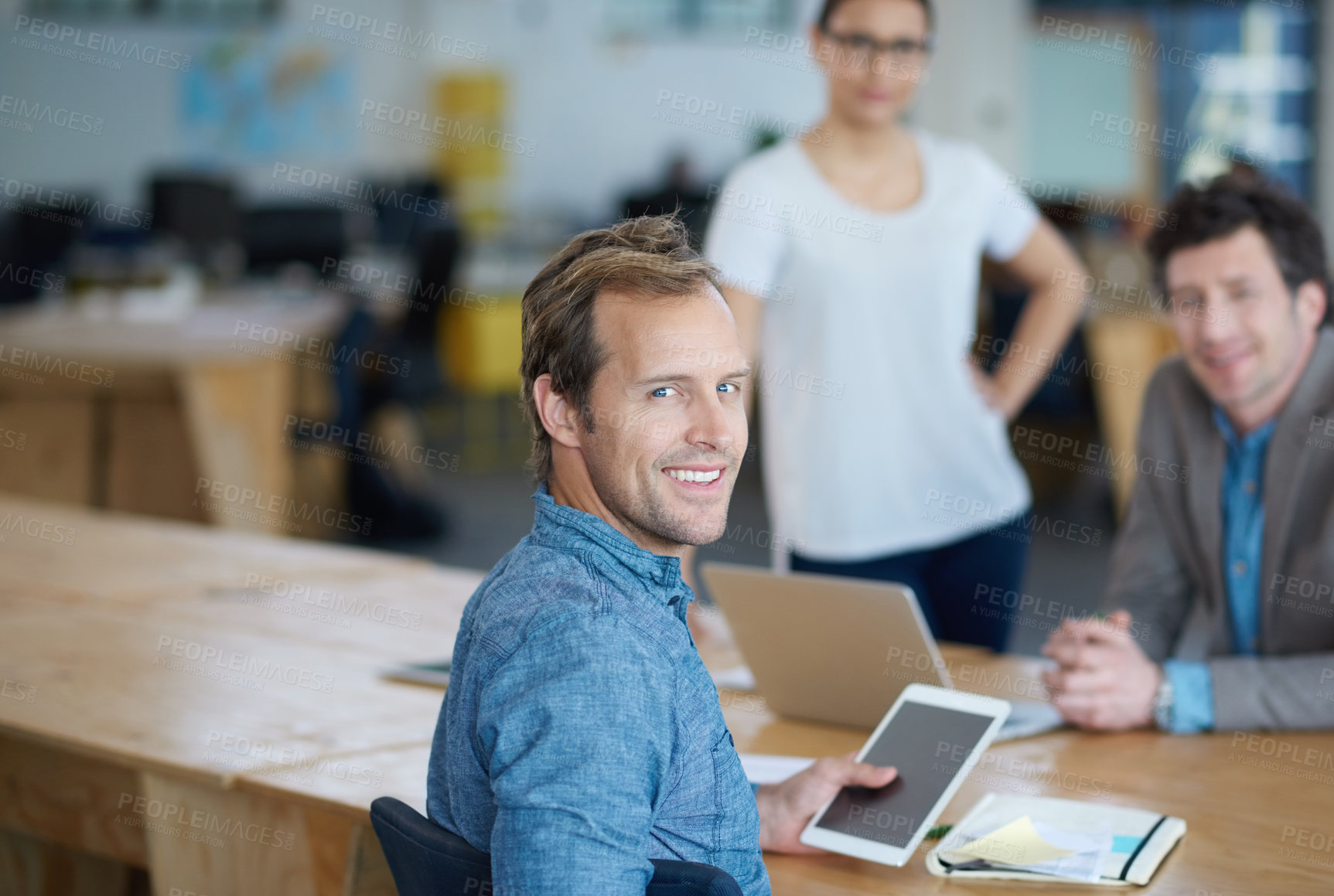 Buy stock photo Teamwork, portrait or happy developers in meeting for discussion or brainstorming together in office. Diversity, digital app or programmers networking with technology, tablet or laptop in workplace