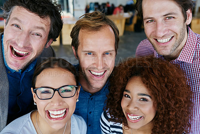 Buy stock photo Closeup portrait of a group of estatic coworkers standing in an office