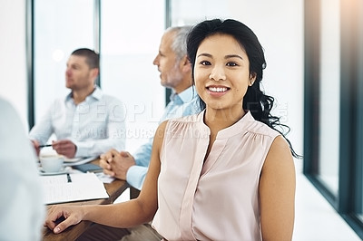 Buy stock photo Businesswoman, smile and portrait for law firm with plans, colleagues and team discussion in background. Female person, office and happy in career with lawyers, coworkers and meeting for updates 