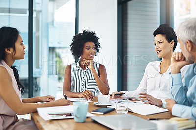 Buy stock photo Creative, business people and team planning in meeting, discussion or brainstorming startup ideas together in office. Designer, group or collaboration on project strategy, conversation or cooperation