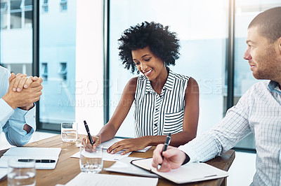 Buy stock photo Smile, business people or team discussion, writing notes or planning for brainstorming startup ideas in meeting. Editor, creative group or collaboration on project strategy on documents for diversity