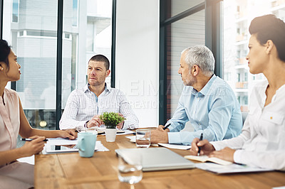 Buy stock photo Business, teamwork and talking or planning in office meeting together, laptop for research with employee brainstorming. Tech, conversation and company project, corporate strategy for collaboration