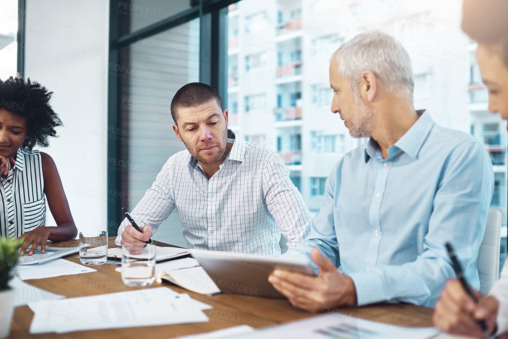 Buy stock photo Business people, boardroom and tablet for report on company growth, teamwork and problem solving. Employees, speaking and office for collaboration at global business, plan and meeting for project