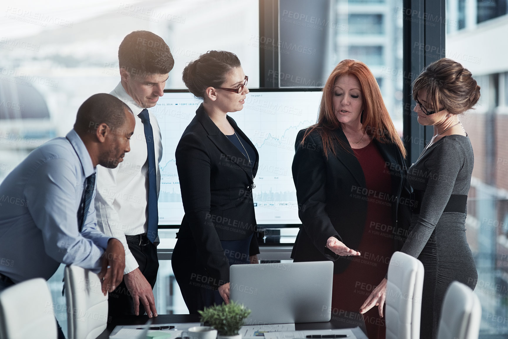 Buy stock photo Collaboration, business meeting and team working on a project in the office conference room. Teamwork, diversity and professional employees planning research on a laptop in the workplace boardroom.