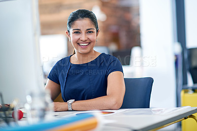 Buy stock photo Portrait of an attractive young businesswoman working in a modern office