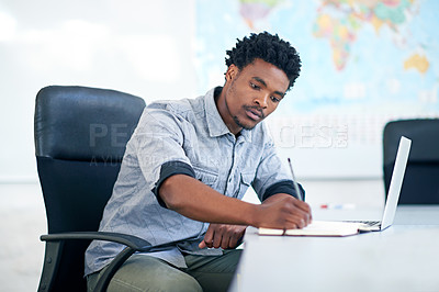 Buy stock photo Desk, thinking and black man with laptop, notes or business plan at international agency. Research, consultant or travel agent in office writing info in notebook for schedule agenda or online booking