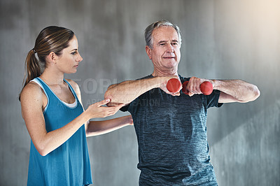 Buy stock photo Physical therapy, dumbbell and coaching with old man and personal trainer for support, health and physiotherapy. Training, weightlifting and fitness with senior patient and physiotherapist for help