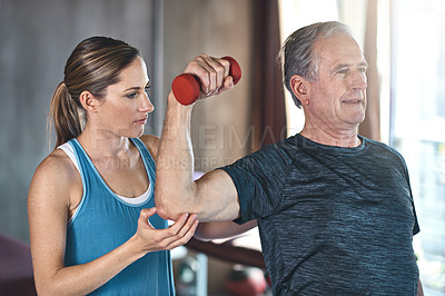 Buy stock photo Support, dumbbell and coaching with old woman and personal trainer for help, health or physiotherapy. Training, weightlifting and fitness with senior patient and physiotherapist for elderly workout