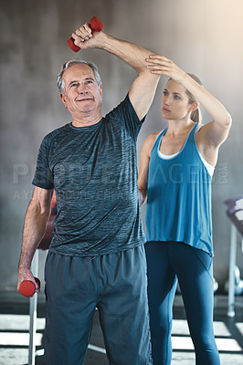 Buy stock photo Physiotherapy, dumbbell and fitness with old man and personal trainer for support, health and workout. Training, weightlifting or coaching with senior patient and physiotherapist for elderly exercise