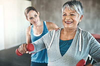 Buy stock photo Physical therapy, dumbbell and fitness with old woman and personal trainer for support, health and physiotherapy. Training, weightlifting and coaching with senior patient and female trainer for help