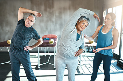 Buy stock photo Stretching, help and old couple with personal trainer for fitness, wellness and physiotherapy. Health, workout or retirement with senior patient and physiotherapist in gym for warm up training