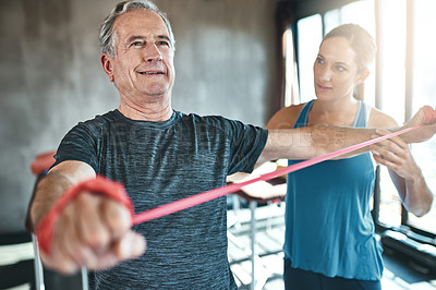 Buy stock photo Physiotherapy, rehabilitation or fitness with an old man and woman coach training together for recovery. Healthcare, wellness and strength with a female physiotherapist helping a senior patient