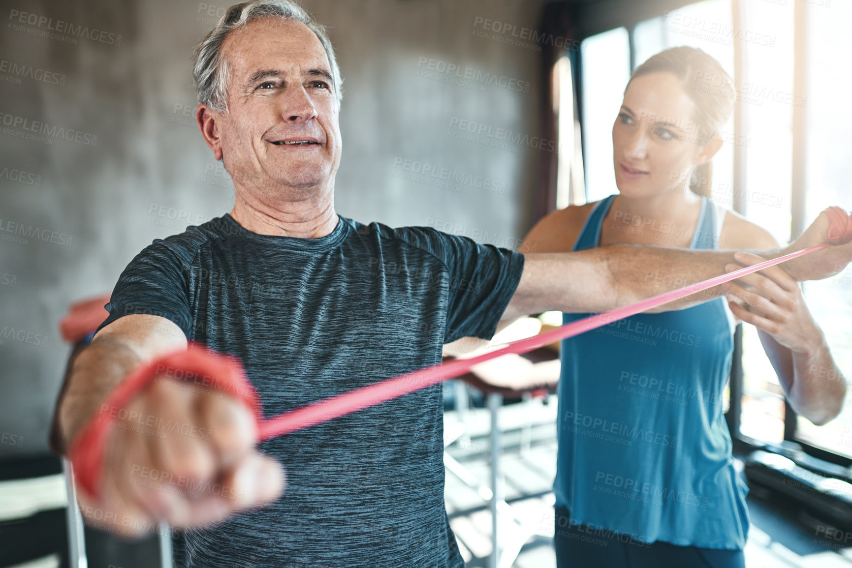 Buy stock photo Physiotherapy, rehabilitation or fitness with an old man and woman coach training together for recovery. Healthcare, wellness and strength with a female physiotherapist helping a senior patient