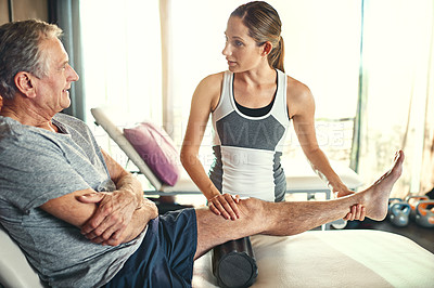 Buy stock photo Old man, physiotherapy and legs with joint pain injury or rehabilitation service, massage or consultation. Woman, senior person and knee examination with muscle stretching, client or inflammation