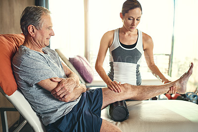 Buy stock photo Old man, physiotherapy and legs treatment for joint pain for accident rehabilitation, massage or consultation. Woman, senior person and knee examination for muscle strain or sports, injury or client