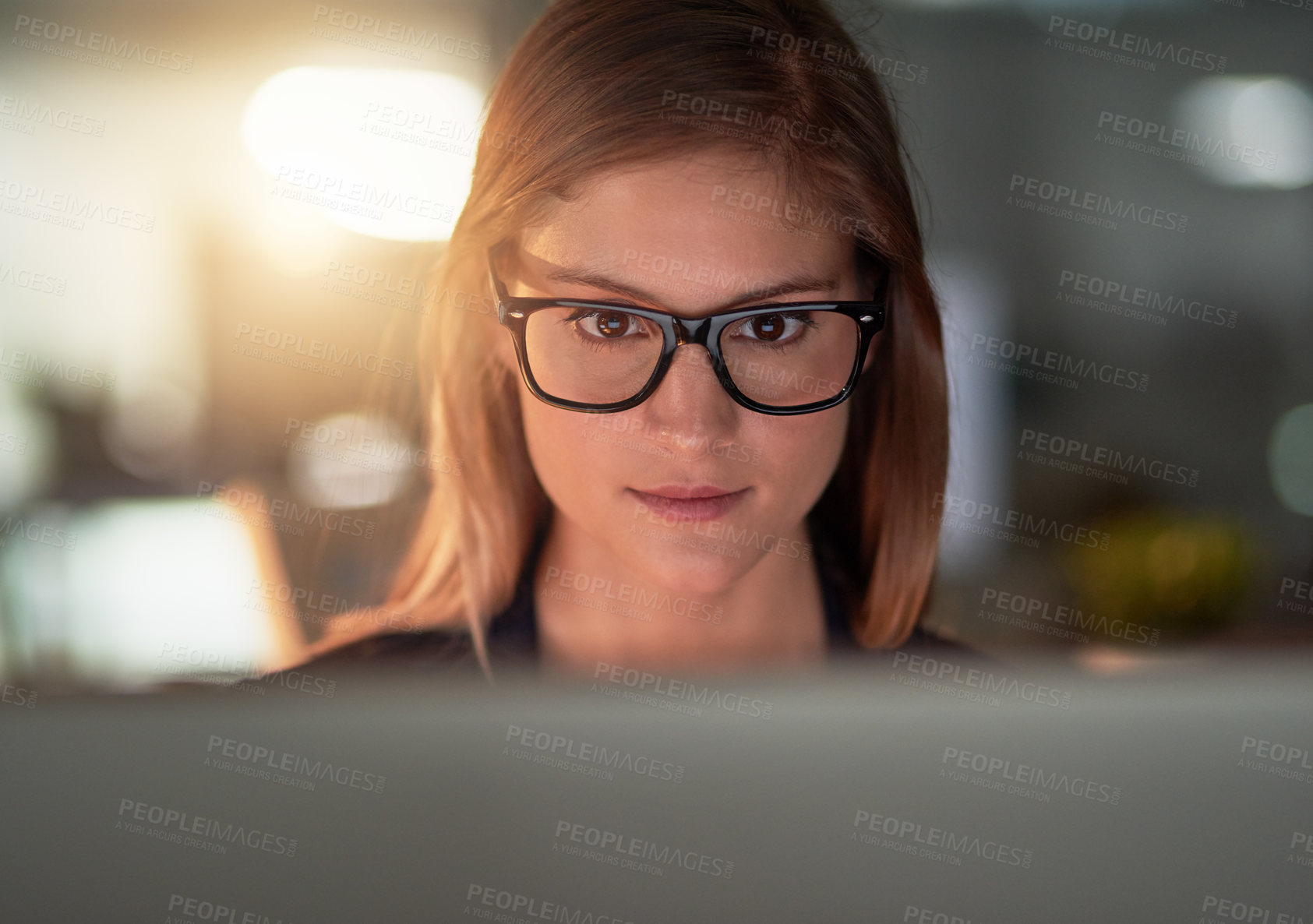 Buy stock photo Cropped shot of a young designer working late in the office
