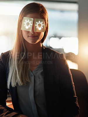 Buy stock photo Shot of a young designer with adhesive notes covering her eyes sitting in the office
