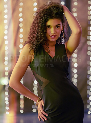Buy stock photo Portrait of a beautiful young woman dancing in a nightclub