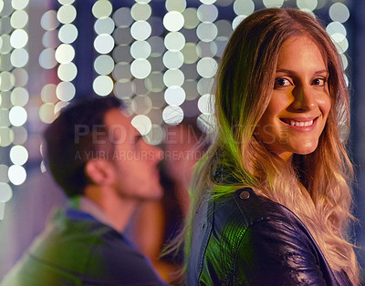 Buy stock photo Portrait of a beautiful young woman enjoying the night out at a club