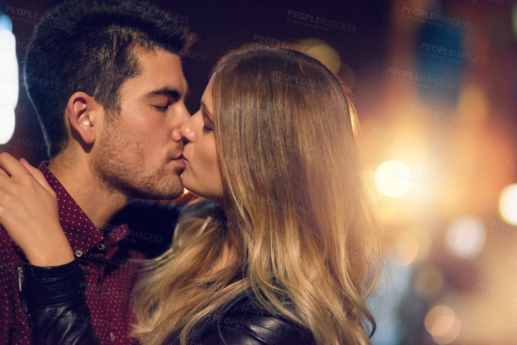 Buy stock photo Kiss, happy couple and love at night in street for support, care and marriage with commitment. Man, woman and dates in New York with partner in city for holiday, honeymoon and urban vacation 