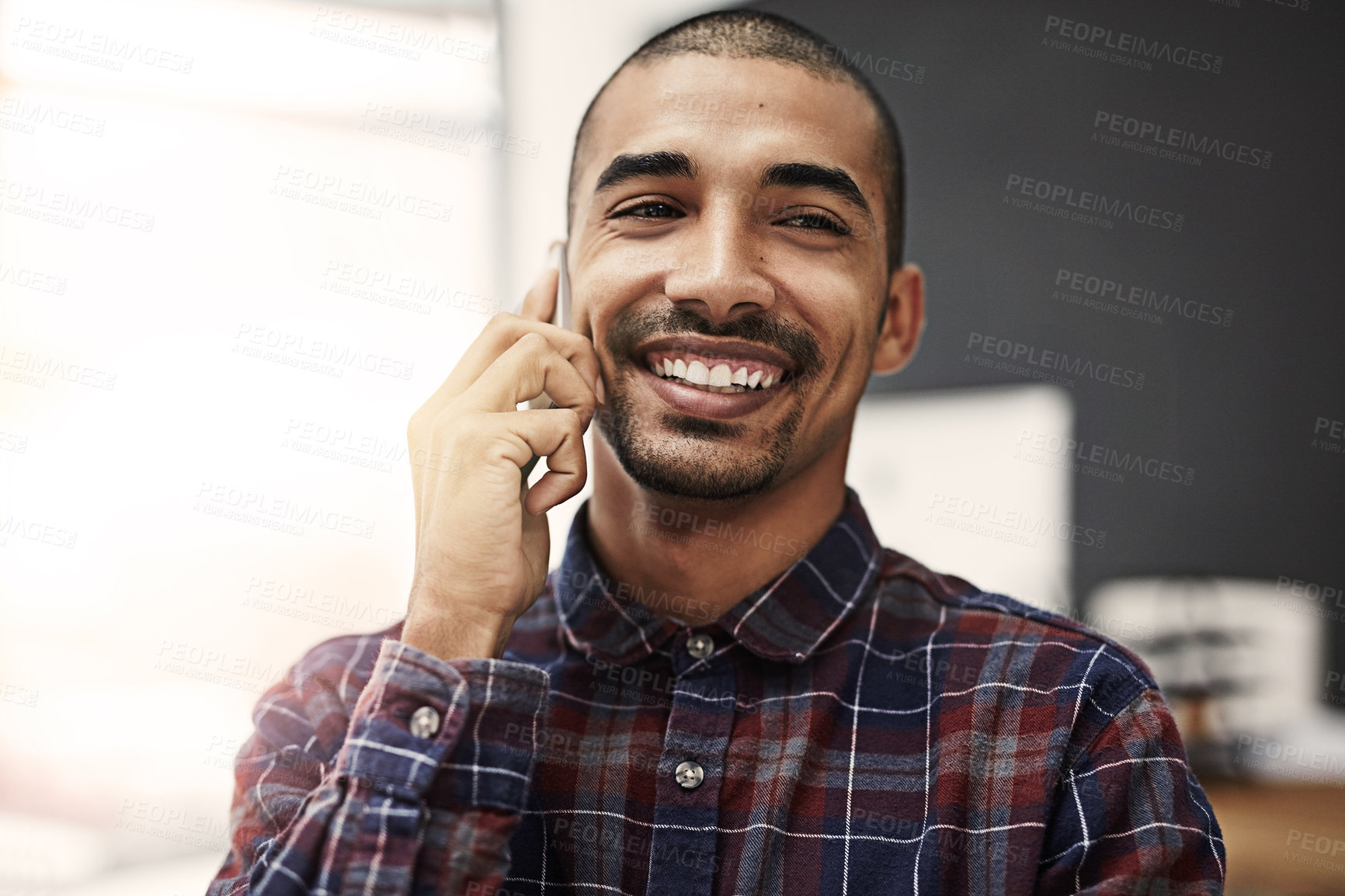 Buy stock photo Business, man and smile with phone call in office of communication, networking and project update. Happy, male designer and mobile for discussion, creative advice and negotiation feedback of proposal