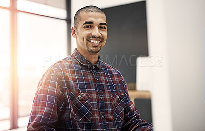 Buy stock photo Portrait of a young entrepreneur working on a computer in an office