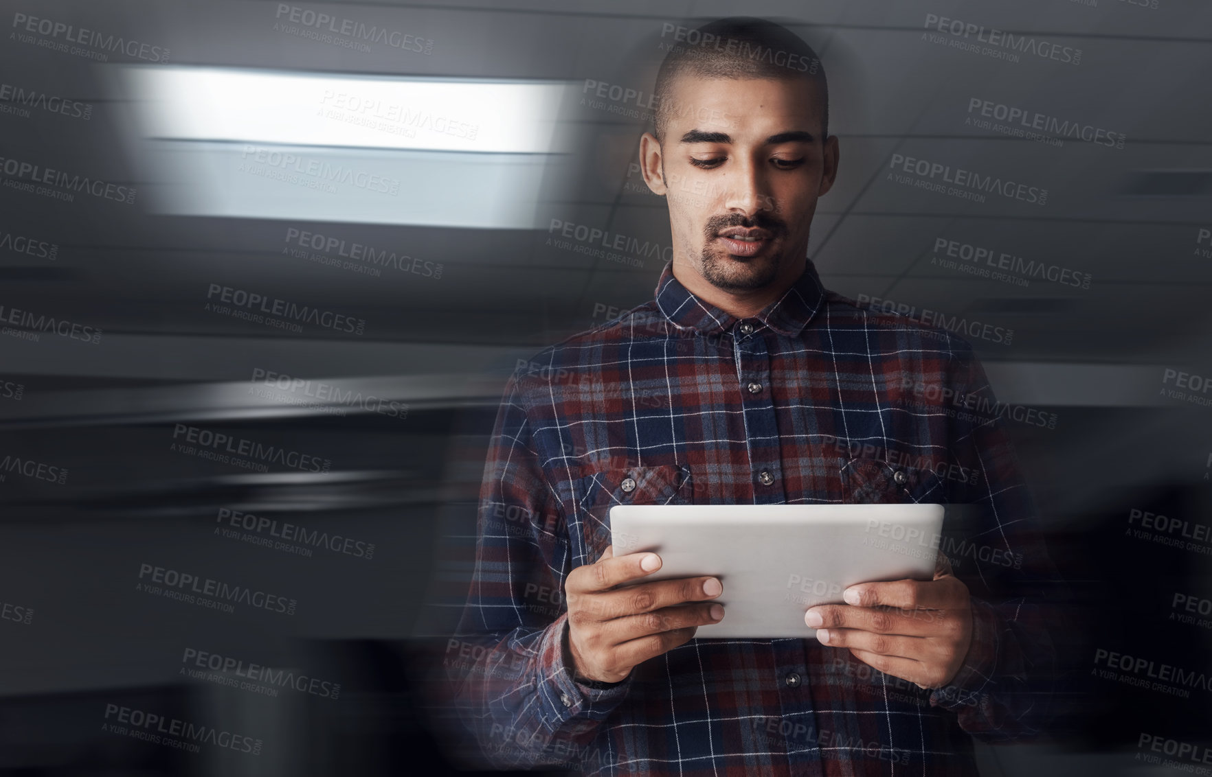 Buy stock photo Employee, man and reading at office with tablet for online reviews, research and insights as social media manager. Male person, business and internet or website for communication or networking