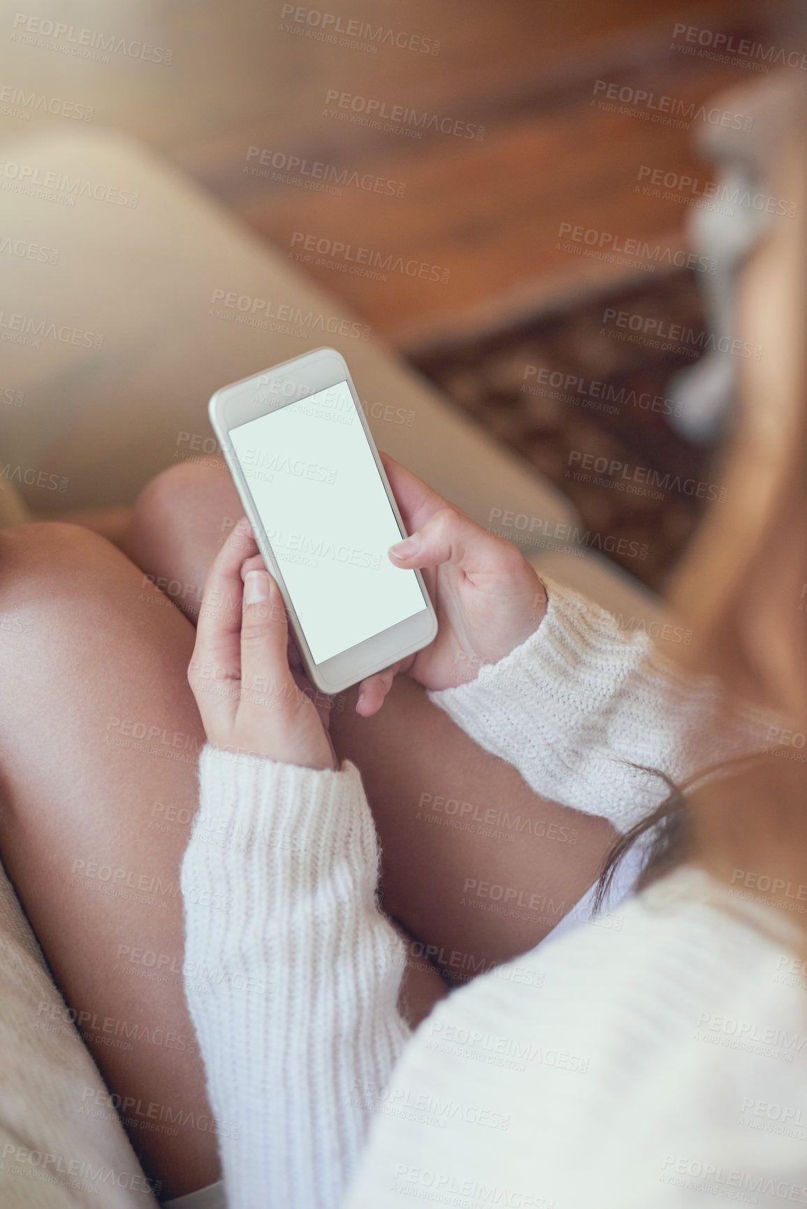 Buy stock photo Hands, phone screen and blank with texting, woman and relax on sofa in lounge with mock up space for ui. Person, smartphone and ux with typing, scroll and promotion for mobile app on couch in home