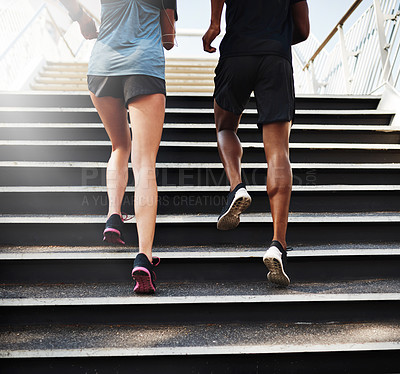 Buy stock photo Fitness, people and legs with running on steps outdoor for marathon training, cardio exercise and teamwork. Back, athlete and runner with morning jog on stairs for competition workout and endurance