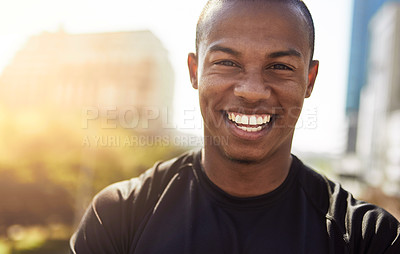 Buy stock photo Portrait of a sporty young man standing outdoors