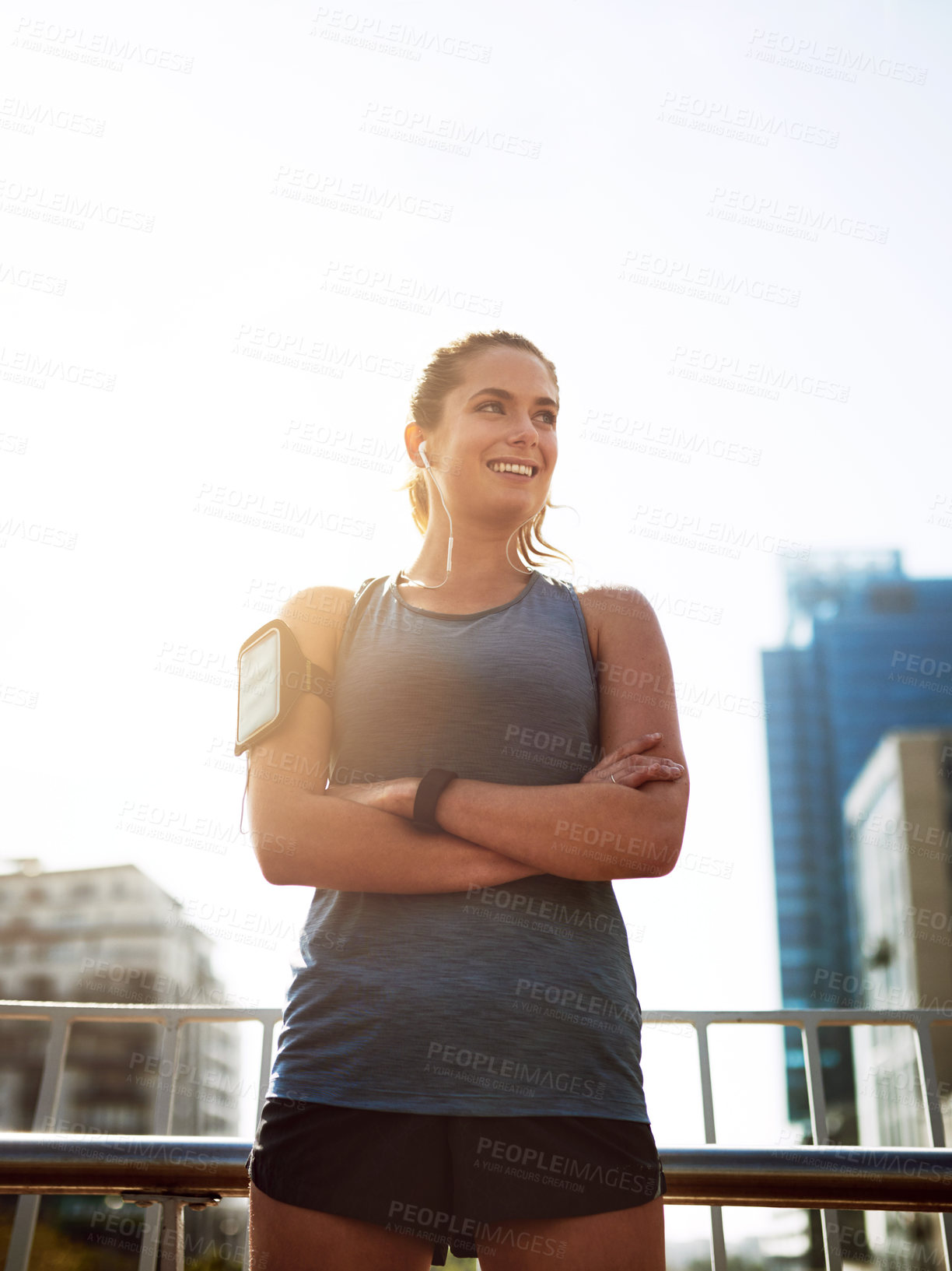 Buy stock photo Happy woman, fitness or city with earphones in confidence for music, workout or outdoor exercise. Young, female person or active runner with smile for podcast, training or health and wellness in town