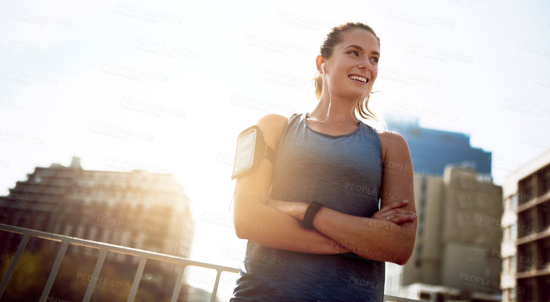 Buy stock photo Fitness, woman and smile with arms crossed in city for outdoor training, wellness and weekend exercise. Happy, thinking and athlete with confidence in urban town for morning run, sports or low angle