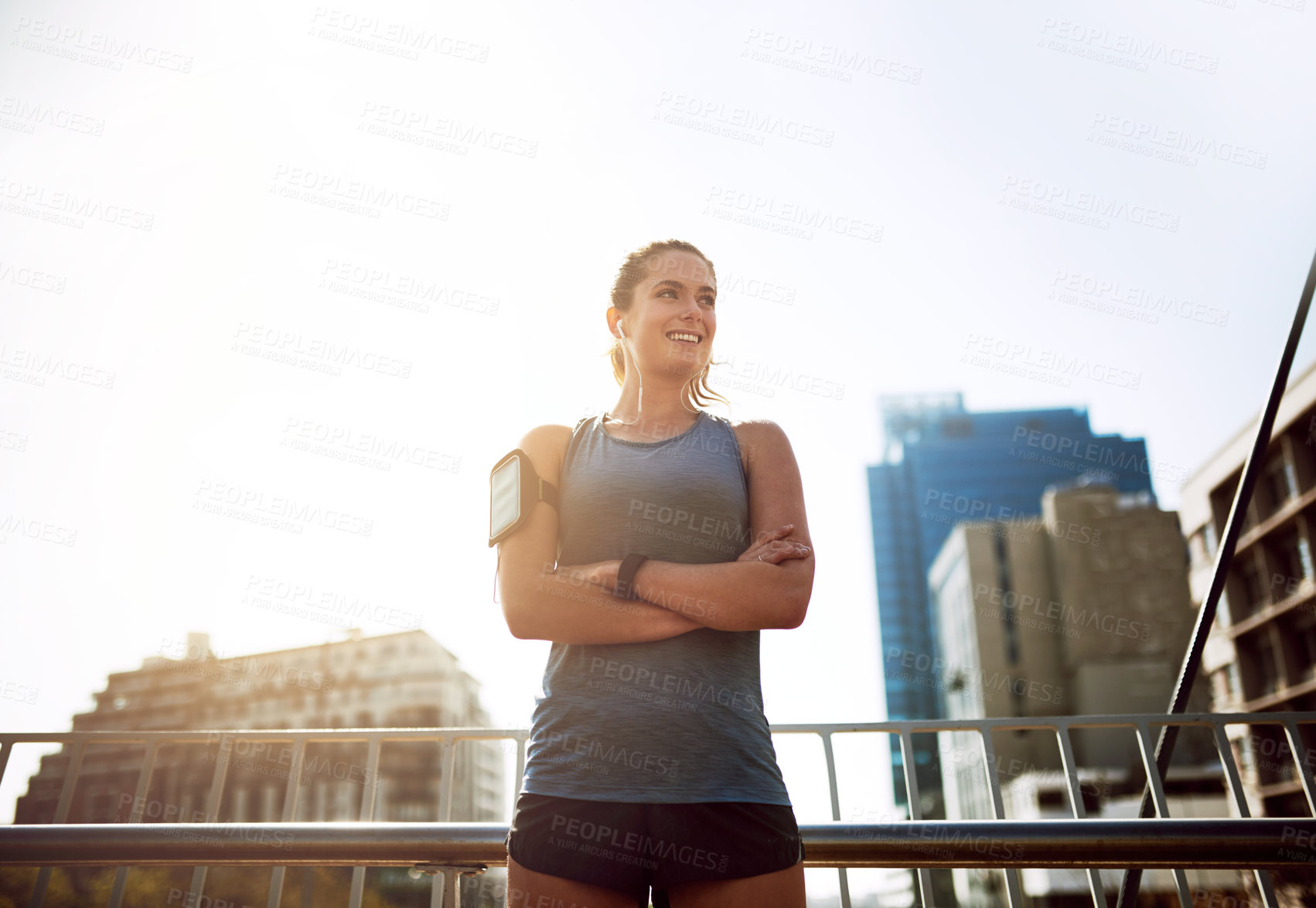 Buy stock photo Exercise, woman and smile with arms crossed in city for outdoor training, wellness and weekend fitness. Happy, thinking and athlete with confidence in urban town for morning workout, sports and run