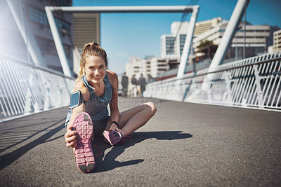 Buy stock photo Happy woman, portrait and stretching with bridge in city for exercise or workout preparation. Young, female person or active runner with smile on road, asphalt or street for warm up in an urban town