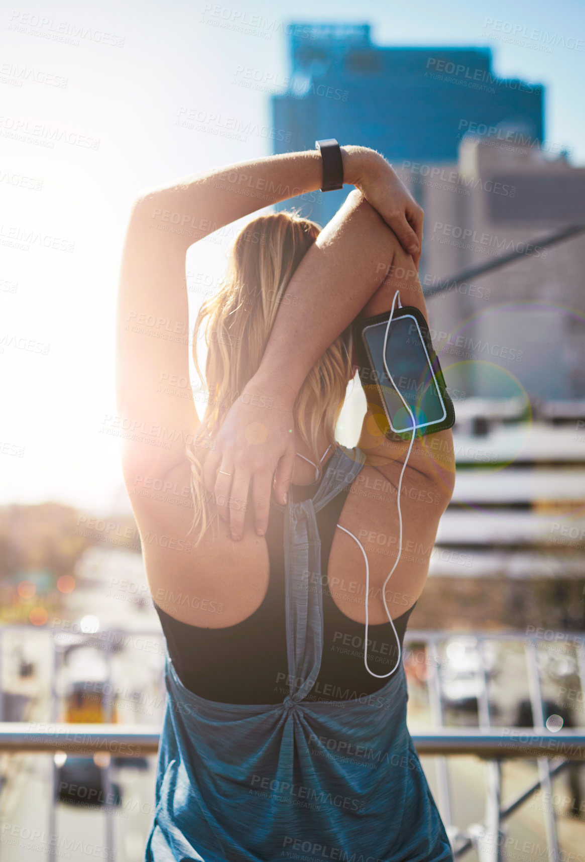 Buy stock photo Woman, stretching and fitness with back in city for exercise or workout preparation in an urban town. Female person, athlete or runner getting ready with arm or body warm up for outdoor training