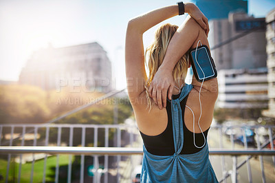 Buy stock photo Woman, exercise and stretching with back in city for fitness or workout preparation in an urban town. Female person, athlete or runner getting ready with arm or body warm up for outdoor training