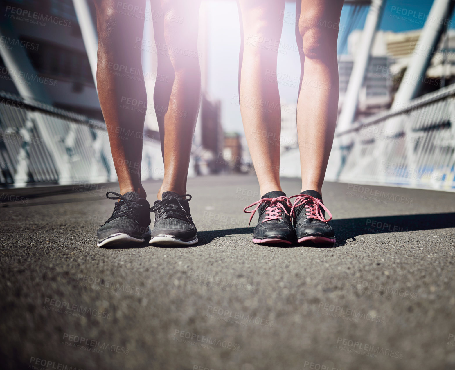 Buy stock photo Runner, together and shoes on bridge for fitness, outdoor and start training with partner in city. People, legs and feet on metro road for exercise, workout and progress for wellness in Costa Rica