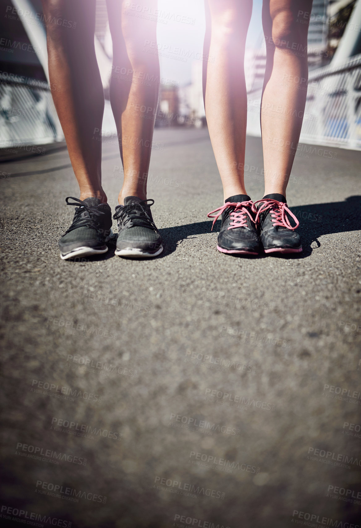 Buy stock photo Runner, together and legs on bridge for fitness, outdoor and start training with partner in city. People, shoes and feet on metro road for exercise, workout and progress for wellness in Costa Rica