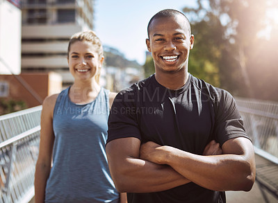 Buy stock photo Personal trainer, man and woman in city for portrait, arms crossed and happy for workout on bridge in morning. People, coach and smile together for training, exercise and fitness in metro town