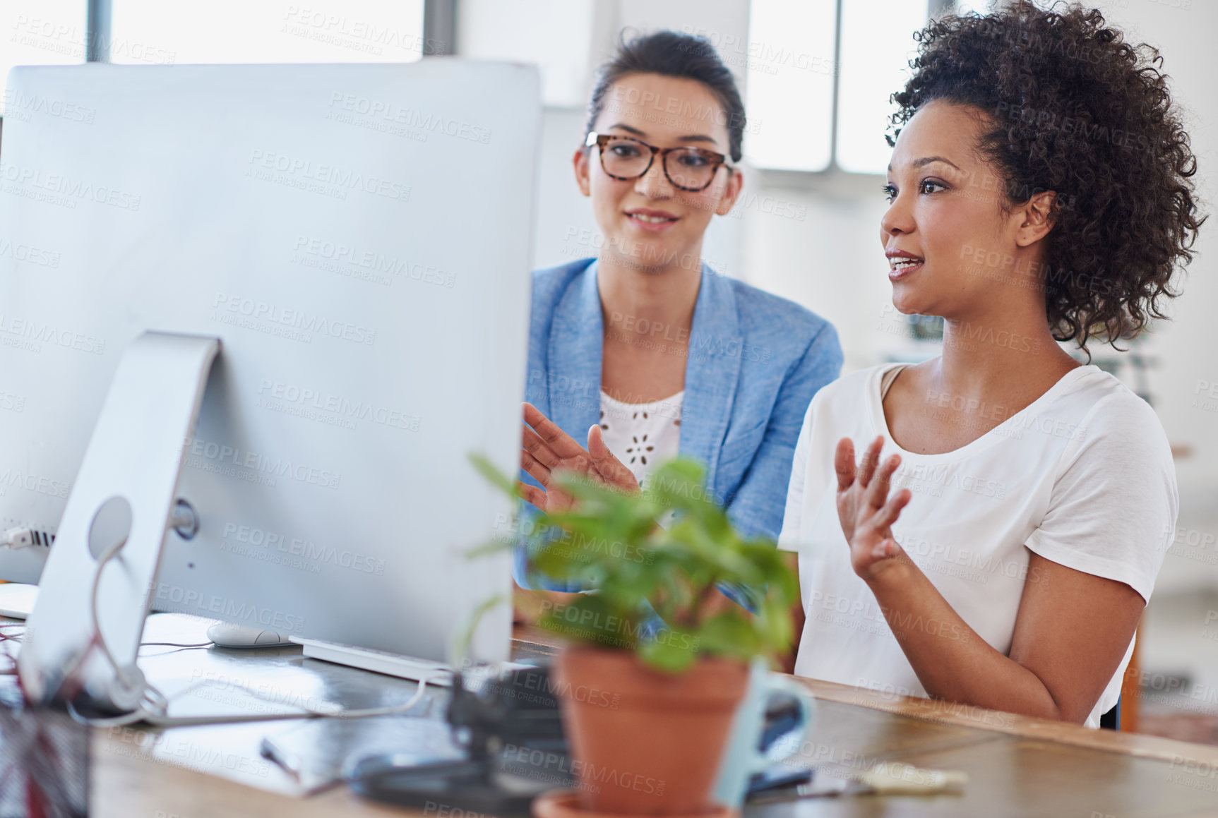 Buy stock photo Female people, coworker and computer in office for brainstorming, project or colleague as web designer. Women, technology and discussion for communication, teamwork or collaboration in digital agency