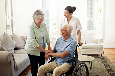Buy stock photo Smile, old man in wheelchair with wife and nurse at nursing home for disability help and rehabilitation. Healthcare, disability and happy senior couple with caregiver in living room for elderly care.