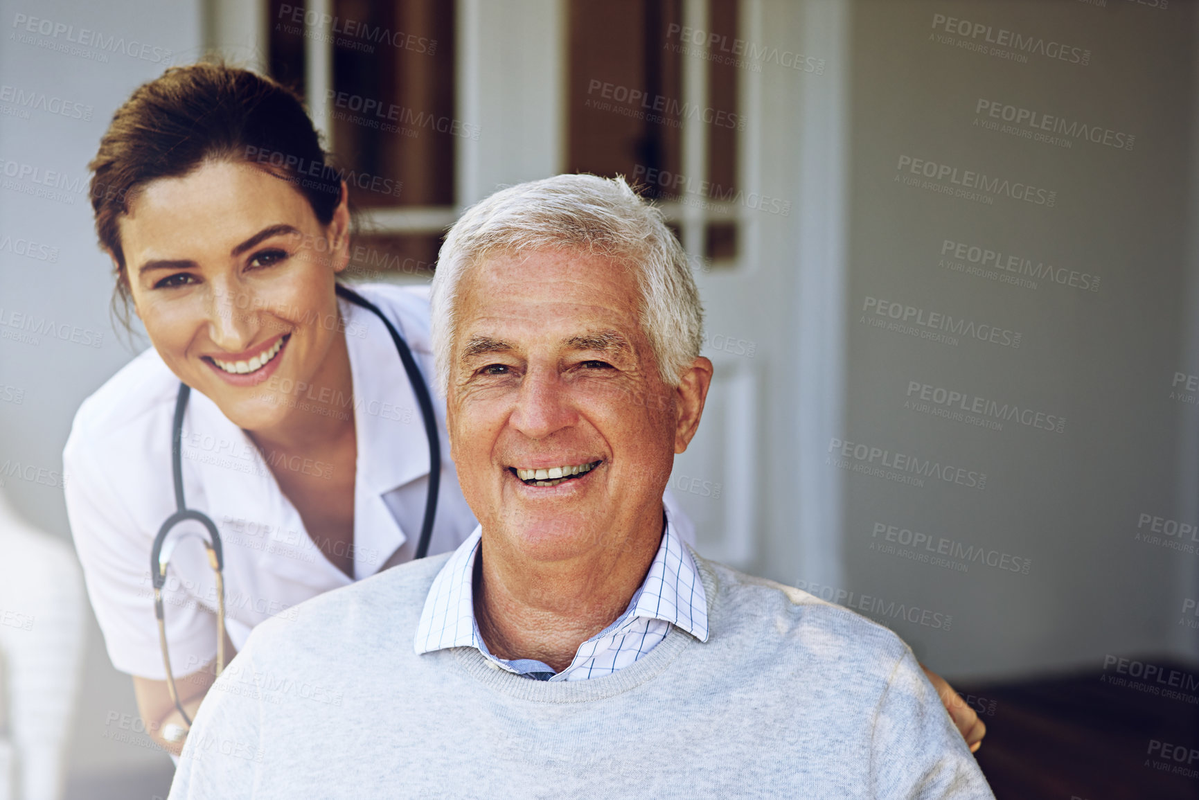 Buy stock photo Portrait of a smiling caregiver and a senior man in a wheelchair outside