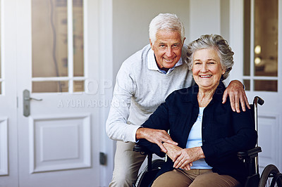 Buy stock photo Portrait of a smiling senior woman in a wheelchair and her husband outside their home