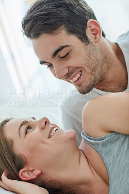 Buy stock photo Couple, house and smile in closeup and together for bonding, love or happy for relationship. Man, woman and bedroom with happiness for relax with trust, vacation or holiday with partner in Paris