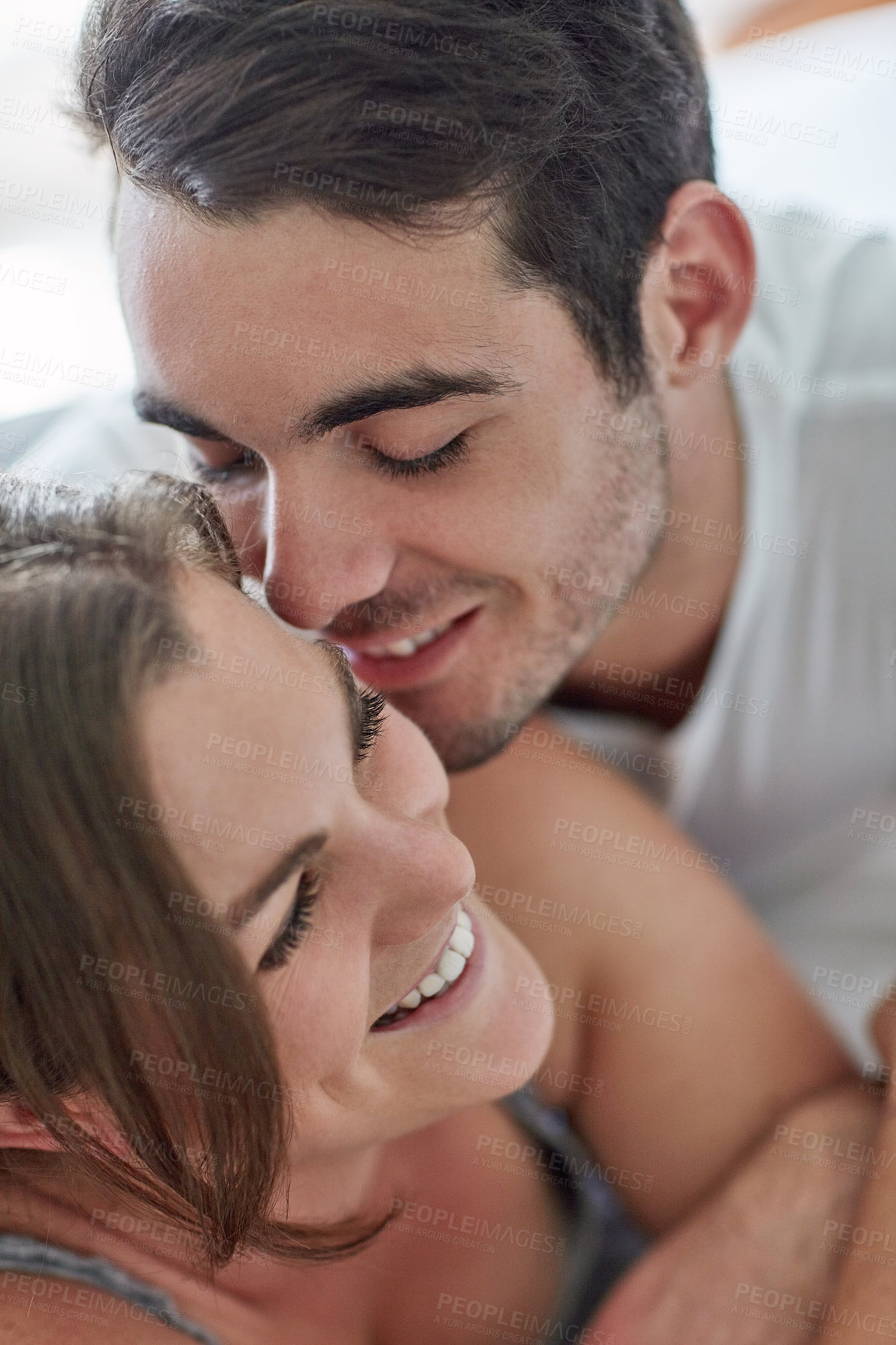 Buy stock photo Couple, room and smile in closeup and together for bonding, love or happy for relationship. Man, woman and happiness for relax with trust, vacation or holiday with partner in Paris or Europe