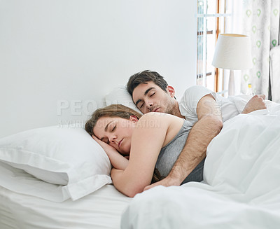 Buy stock photo Peace, sleeping and couple hug in bed with love, safety and security, comfort and bonding in their home. Relax, sleep and people in bedroom with nap, snooze or lazy morning, dream or rest in a house